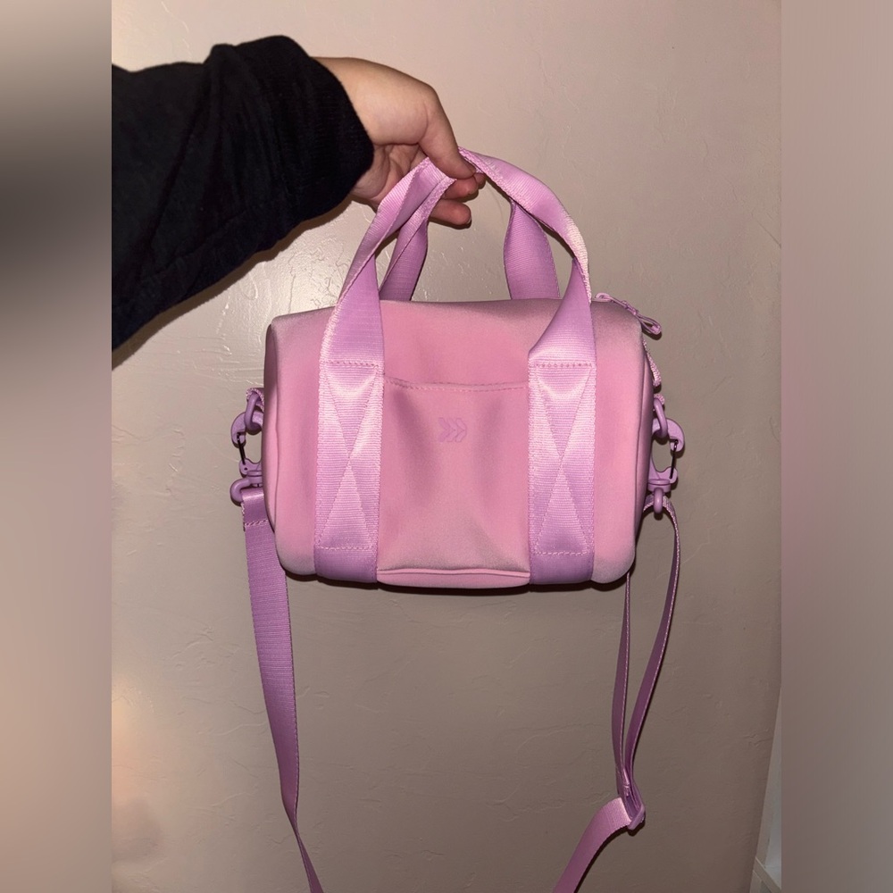 Pink mini duffle bag